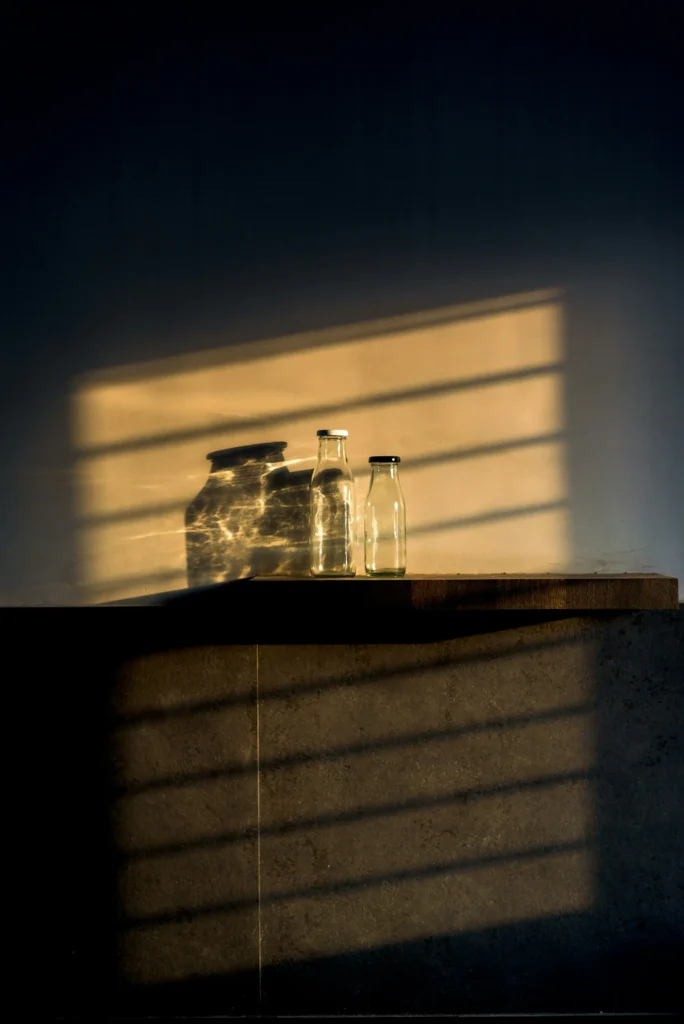Natural morning light casting shadows through a window as part of a healthy morning habit
