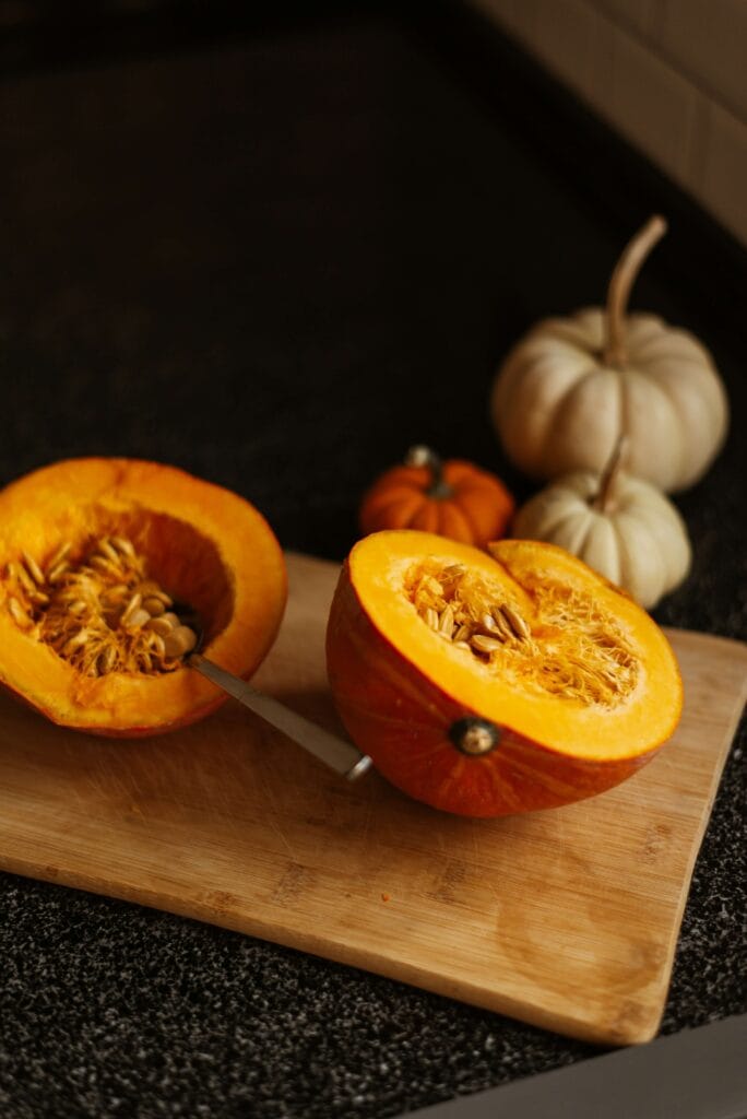 Pumpkin cut open showing seeds - natural source of zinc